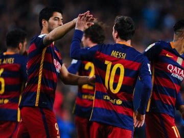 Leo Messi y Luis Suárez celebran un gol ante el Celta
