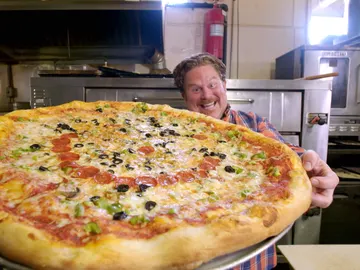 Una pizza de 74 centímetros Una pizza de 74 centímetros